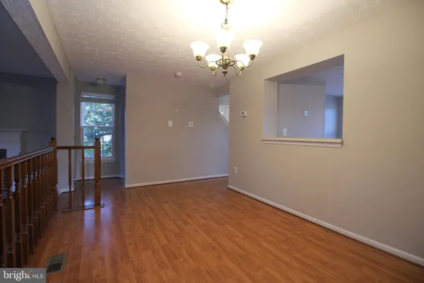 a view of livingroom with wooden floor