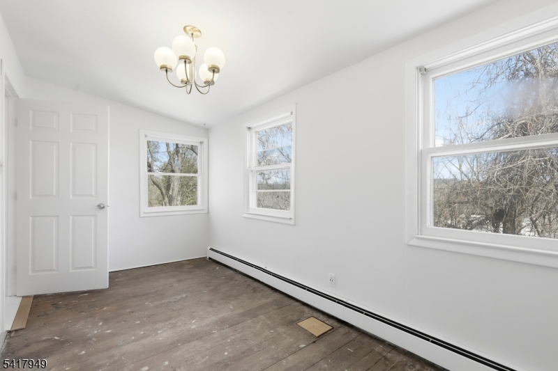 10 Minnehaha Path Lincoln Park, NJ 07035 - Photo 16 of 32 a view of an empty room with a window