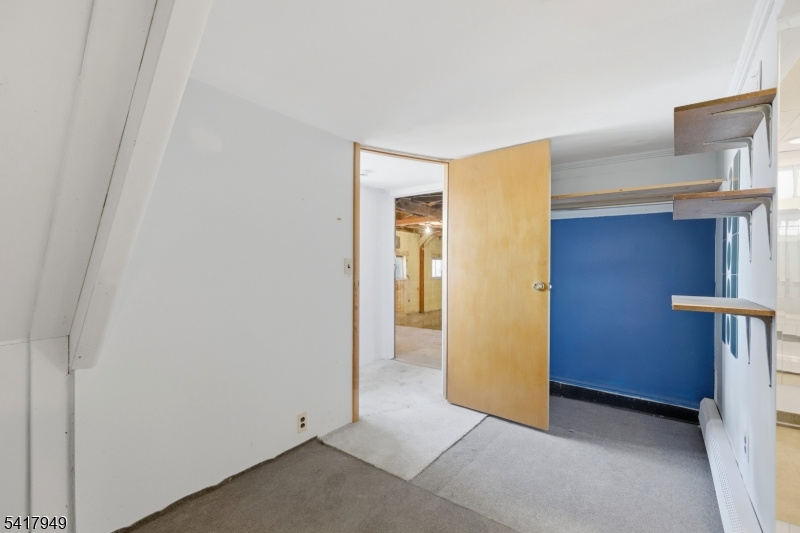 10 Minnehaha Path Lincoln Park, NJ 07035 - Photo 21 of 32 a view of an empty room with a fireplace