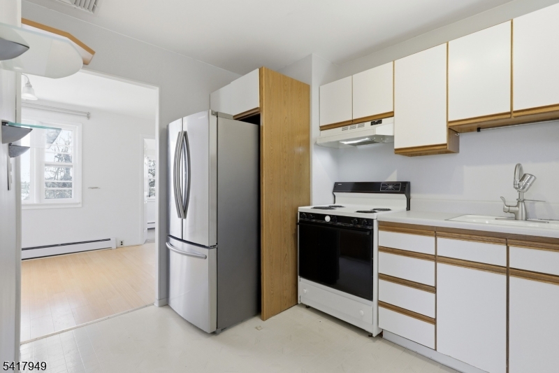10 Minnehaha Path Lincoln Park, NJ 07035 - Photo 10 of 32 a kitchen with stainless steel appliances granite countertop a refrigerator and a sink