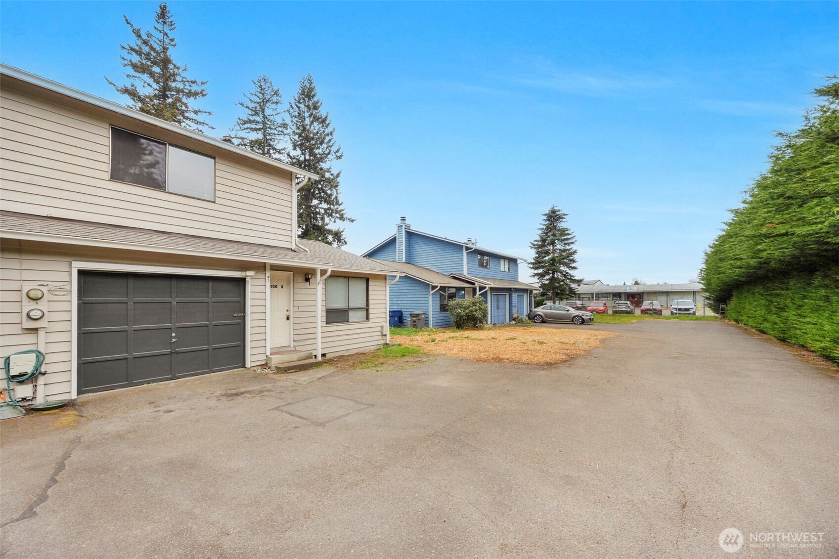 6920 Armar Road Marysville, WA 98270 - Photo 3 of 24 a view of a house with a yard and garage