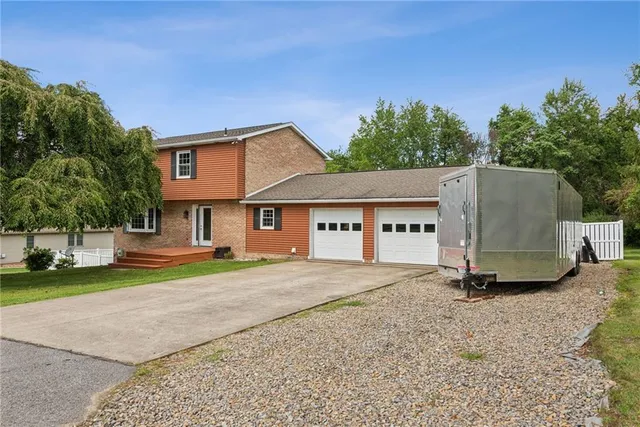 a view of house with outdoor space and street view