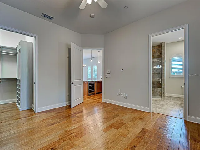 a view of a hallway with a room