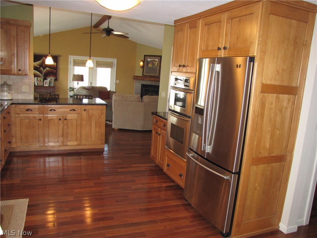 38836 Norwalk Road Litchfield, OH 44253 - Photo 4 of 27 The kitchen of your dreams! Enough room to create a buffet with a crowd or a dinner for two. Granite counter tops, elder wood cabinet and stainless appliances will be waiting for you.