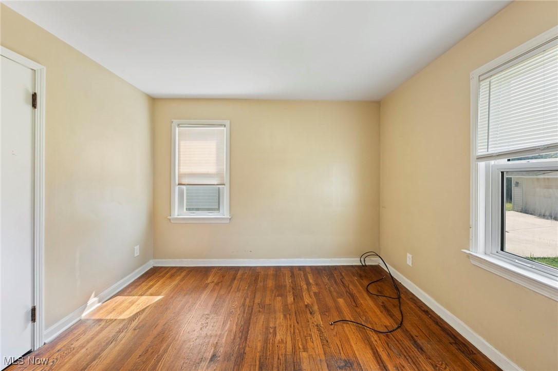 14804 Rockside Road Maple Heights, OH 44137 - Photo 28 of 44 Unfurnished room with wood finished floors and baseboards