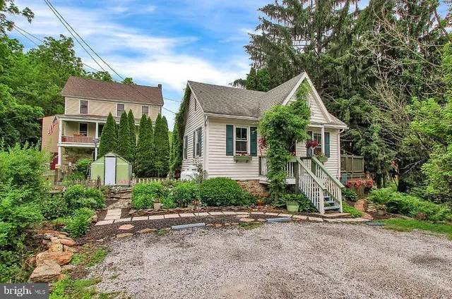 front view of a house with a street
