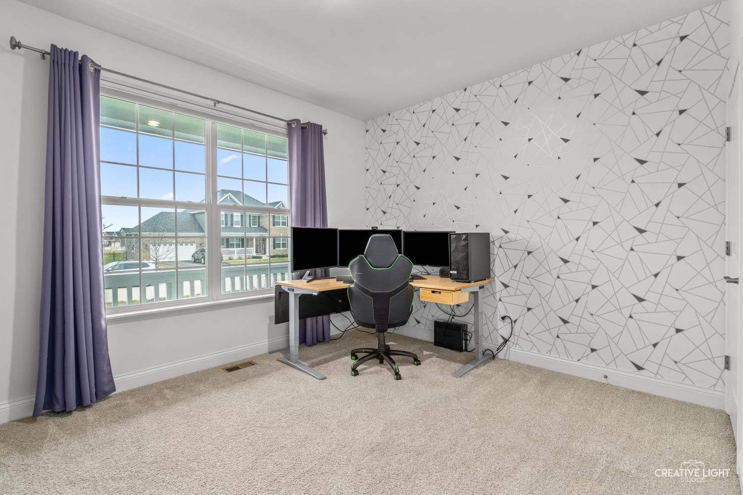 3638 Emerald Road Elgin, IL 60124 - Photo 13 of 18 a work room with furniture and a window