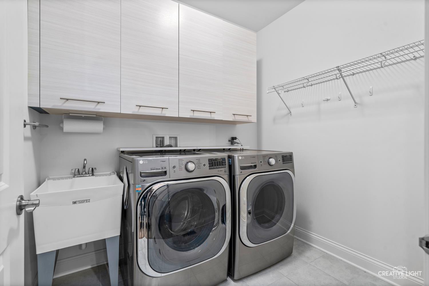 3638 Emerald Road Elgin, IL 60124 - Photo 14 of 18 a utility room with dryer and washer
