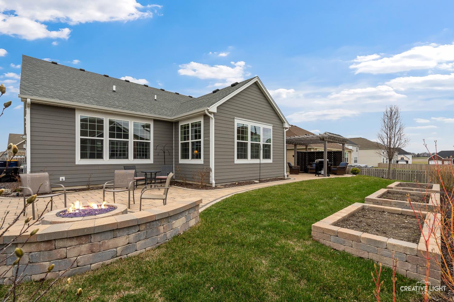 3638 Emerald Road Elgin, IL 60124 - Photo 15 of 18 a front view of a house with a yard