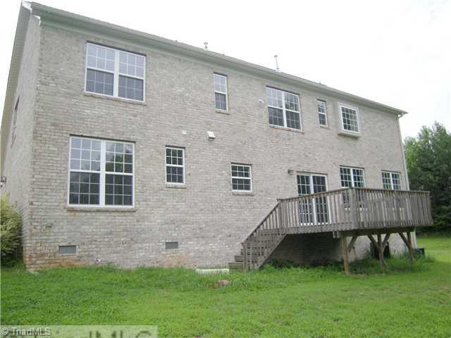 6413 Peppermill Drive Oak Ridge, NC 27310 - Photo 2 of 14 Exterior Back.