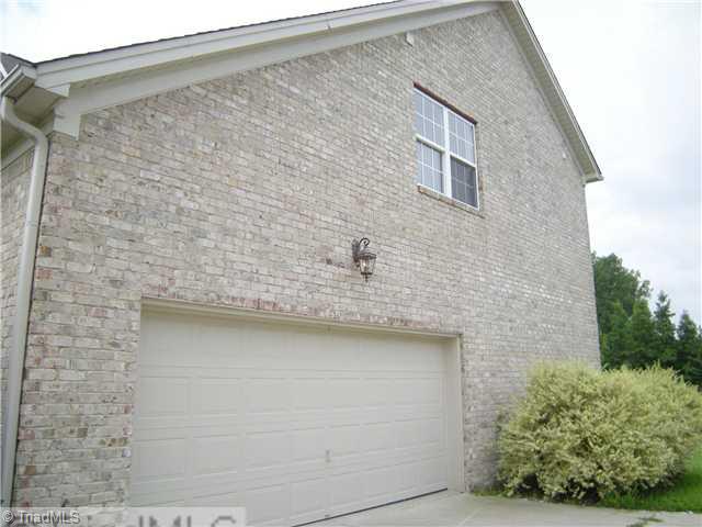 6413 Peppermill Drive Oak Ridge, NC 27310 - Photo 3 of 14 Other. Side entry garage
