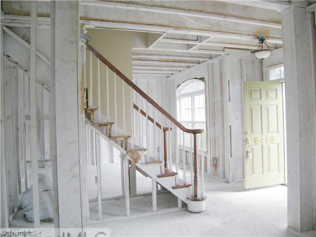 6413 Peppermill Drive Oak Ridge, NC 27310 - Photo 4 of 14 Entry. Front entry and stairway