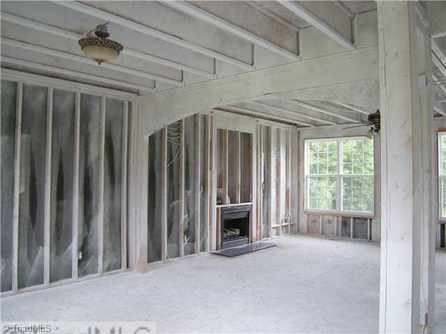 6413 Peppermill Drive Oak Ridge, NC 27310 - Photo 7 of 14 Living Room. Living room/Family room