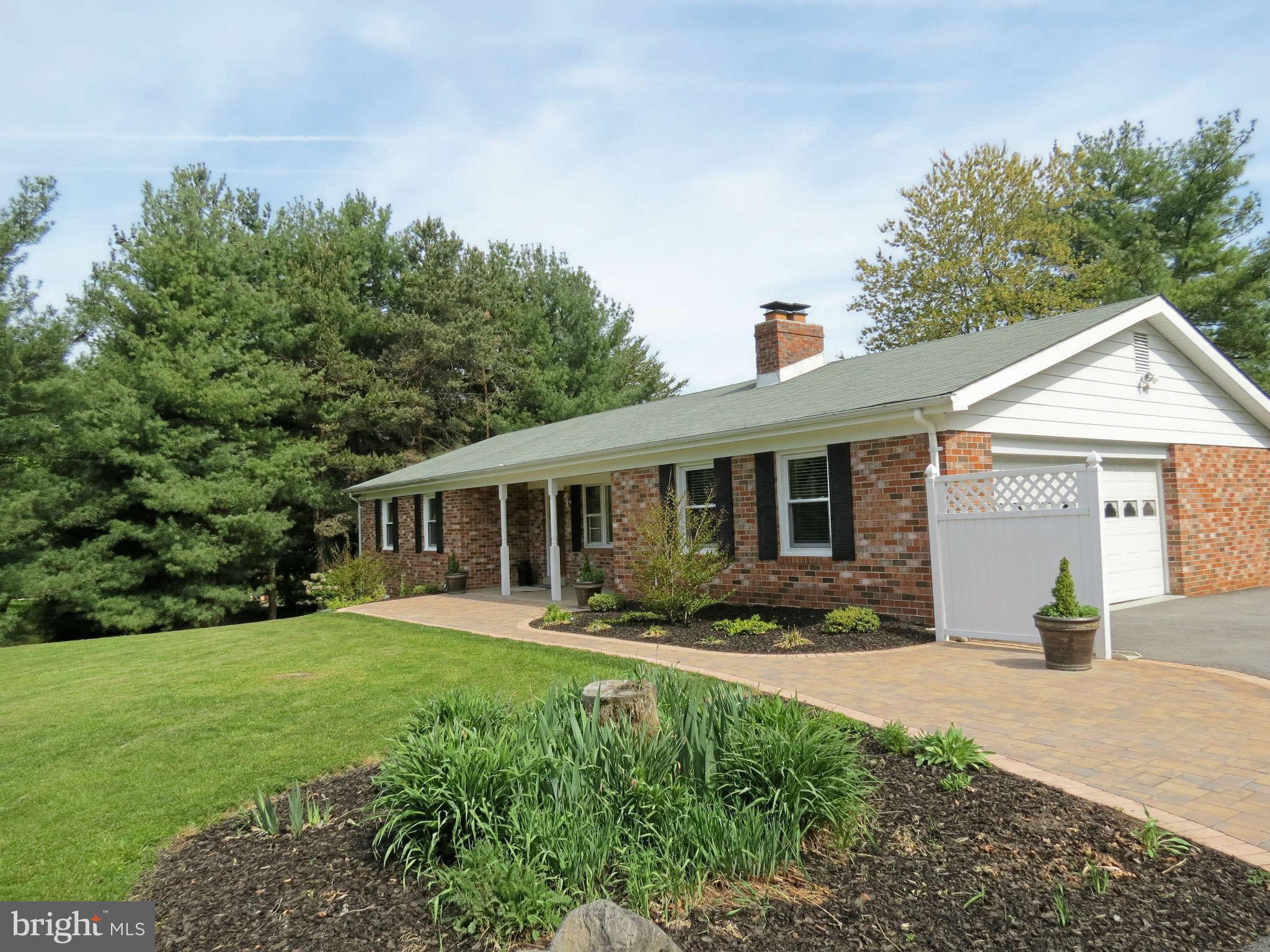 2353 Braddock Road Mount Airy, MD 21771 - Photo 3 of 30 Lovely Landscaped Paver Walk-way