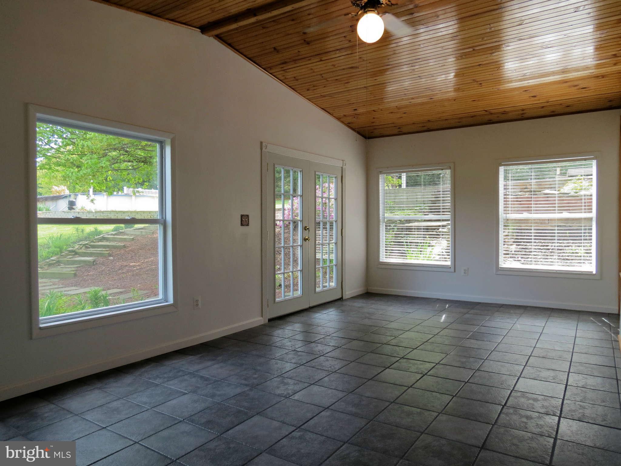 2353 Braddock Road Mount Airy, MD 21771 - Photo 22 of 30 Sunroom with Atrium Doors to Rear Yard