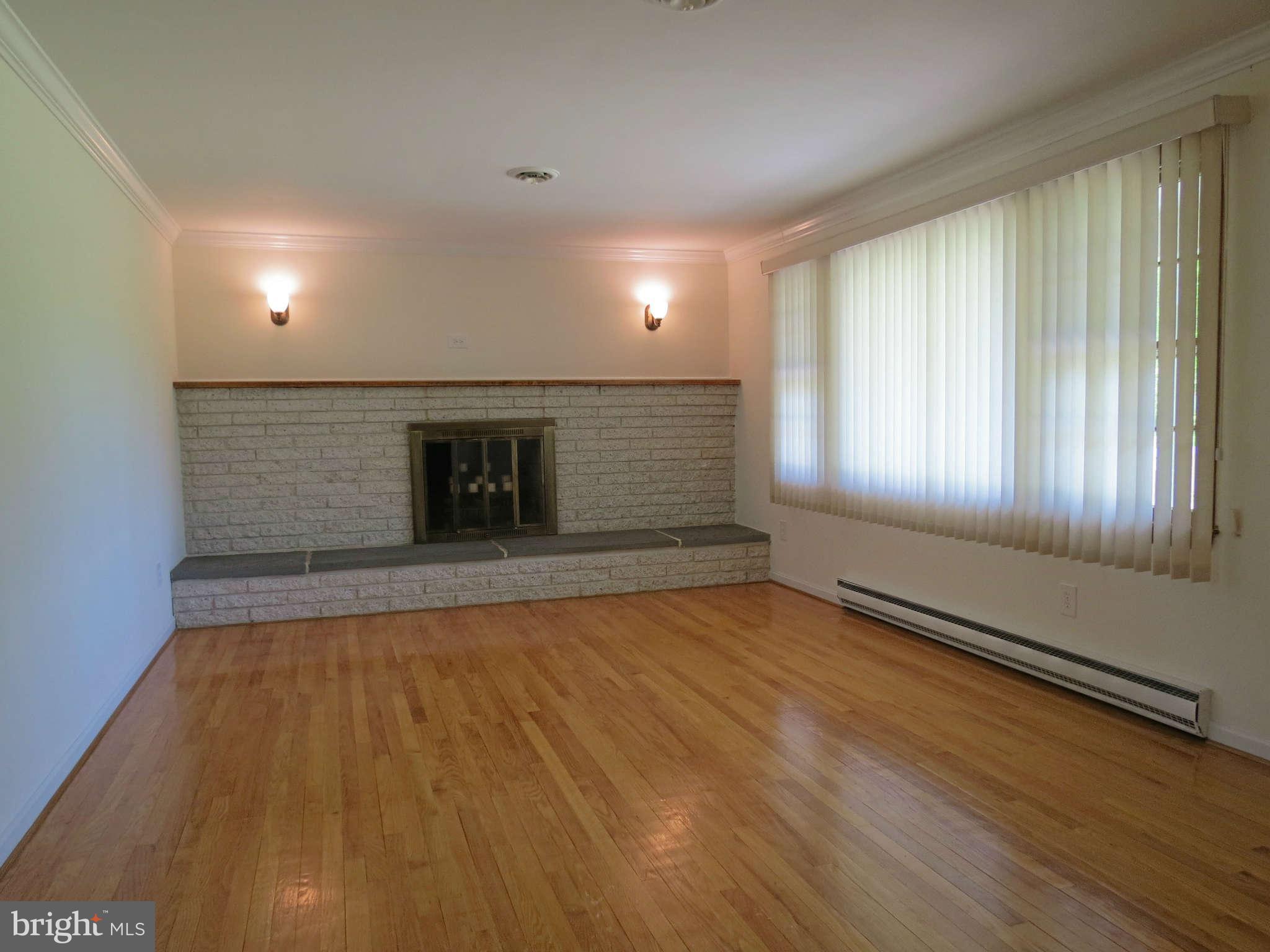 2353 Braddock Road Mount Airy, MD 21771 - Photo 6 of 30 Living Room has Fireplace
