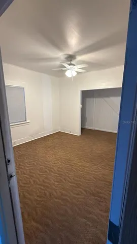 en empty room with fan