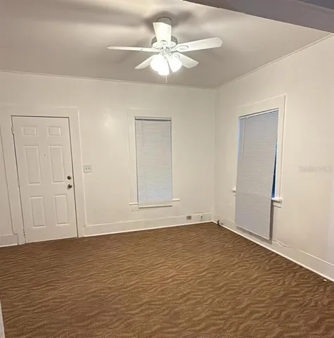 a view of an empty room with window