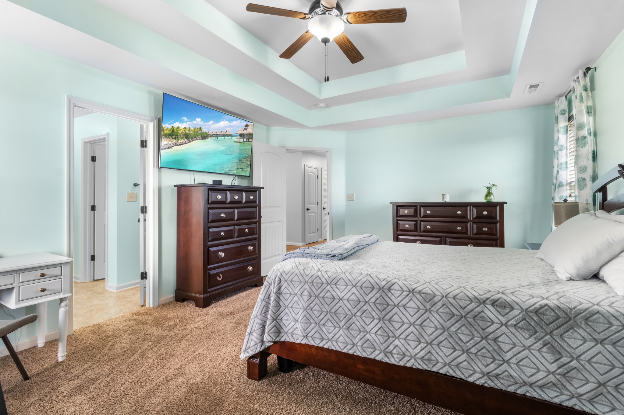 1069 Castlerock Drive Clarksville, TN 37042 - Photo 11 of 25 a bedroom with a bed and a chandelier