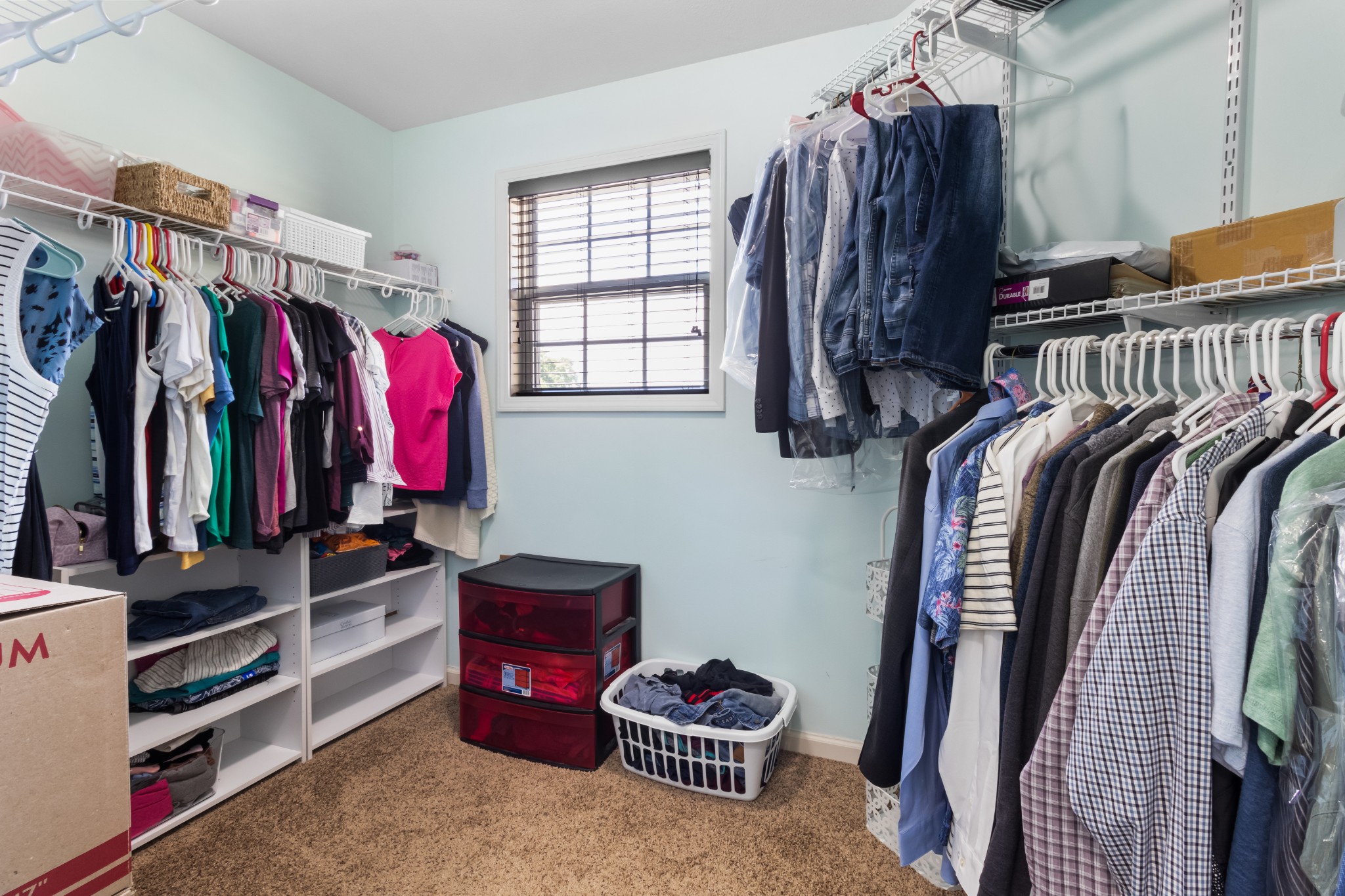 1069 Castlerock Drive Clarksville, TN 37042 - Photo 14 of 25 a view of walk in closet with clothes and shoes