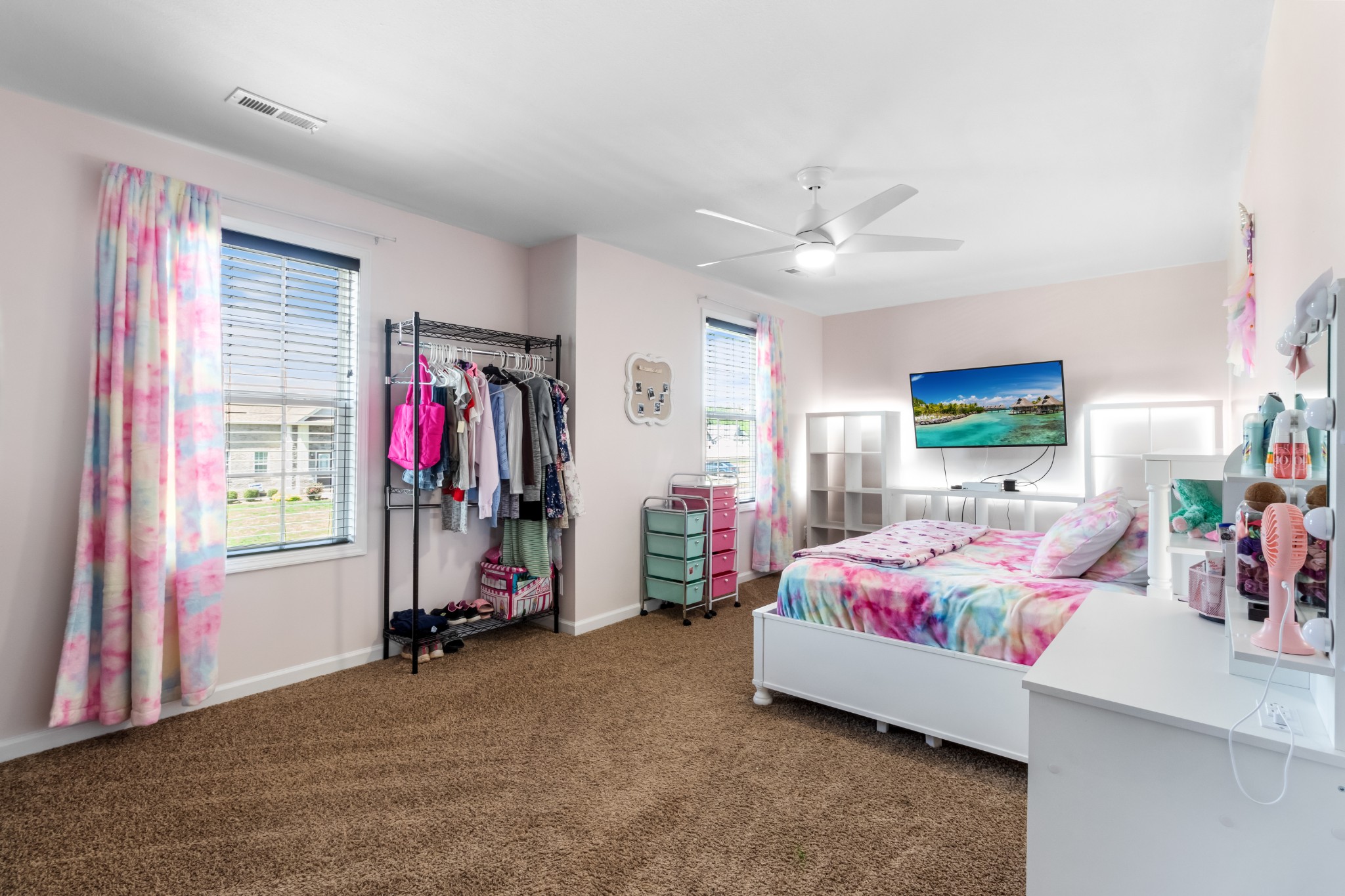 1069 Castlerock Drive Clarksville, TN 37042 - Photo 20 of 25 a bedroom with furniture and a flat screen tv