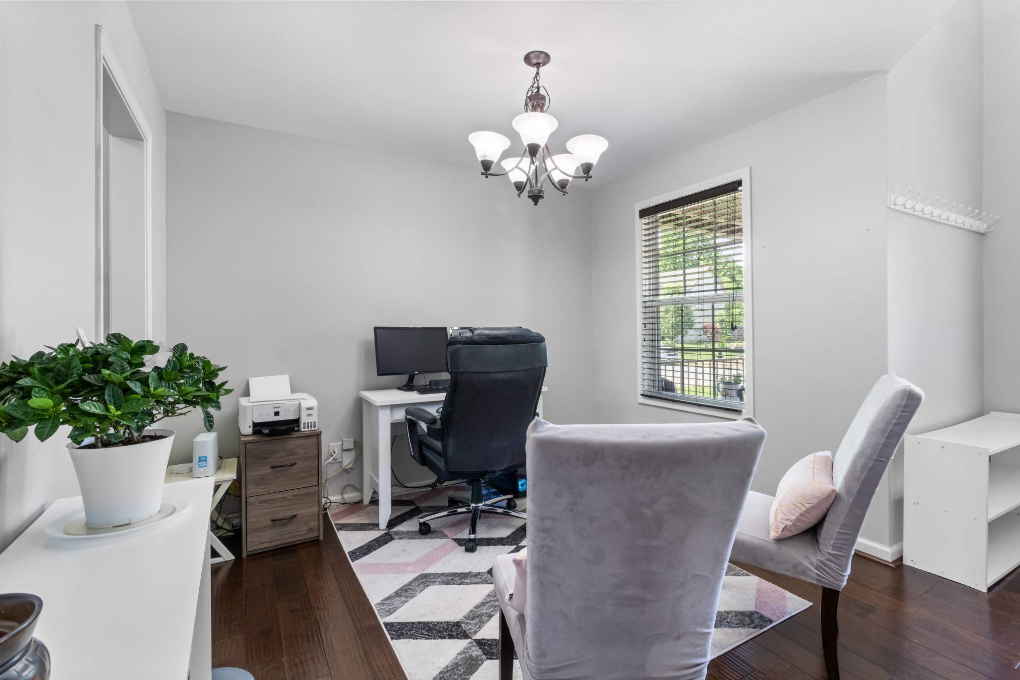 1069 Castlerock Drive Clarksville, TN 37042 - Photo 4 of 25 a view of a dining room with furniture and wooden floor