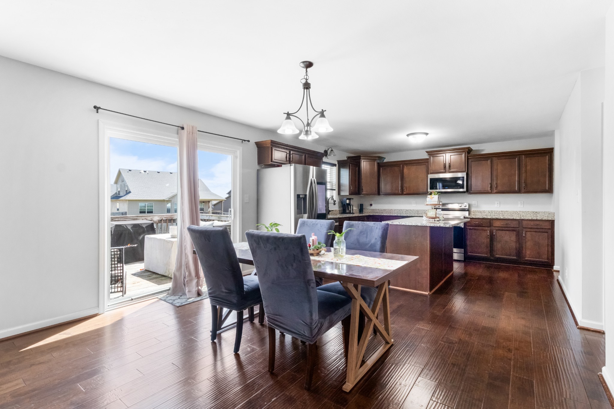 1069 Castlerock Drive Clarksville, TN 37042 - Photo 8 of 25 a view of a dining room with furniture window and wooden floor