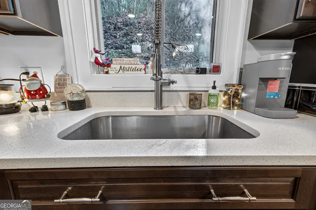 a view closed with a sink and cabinets