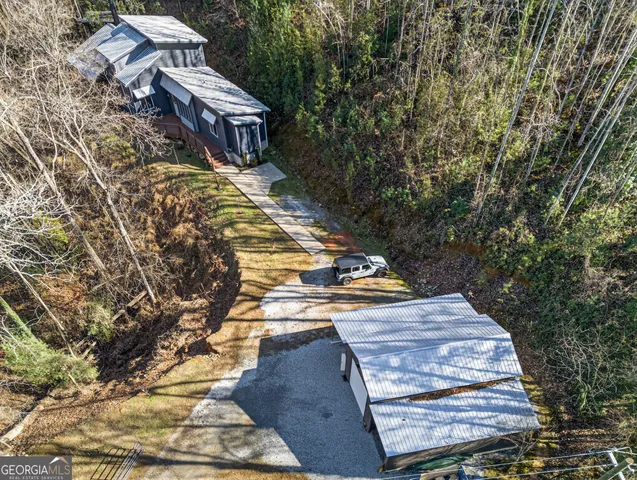 a view of a swimming pool with an outdoor seating