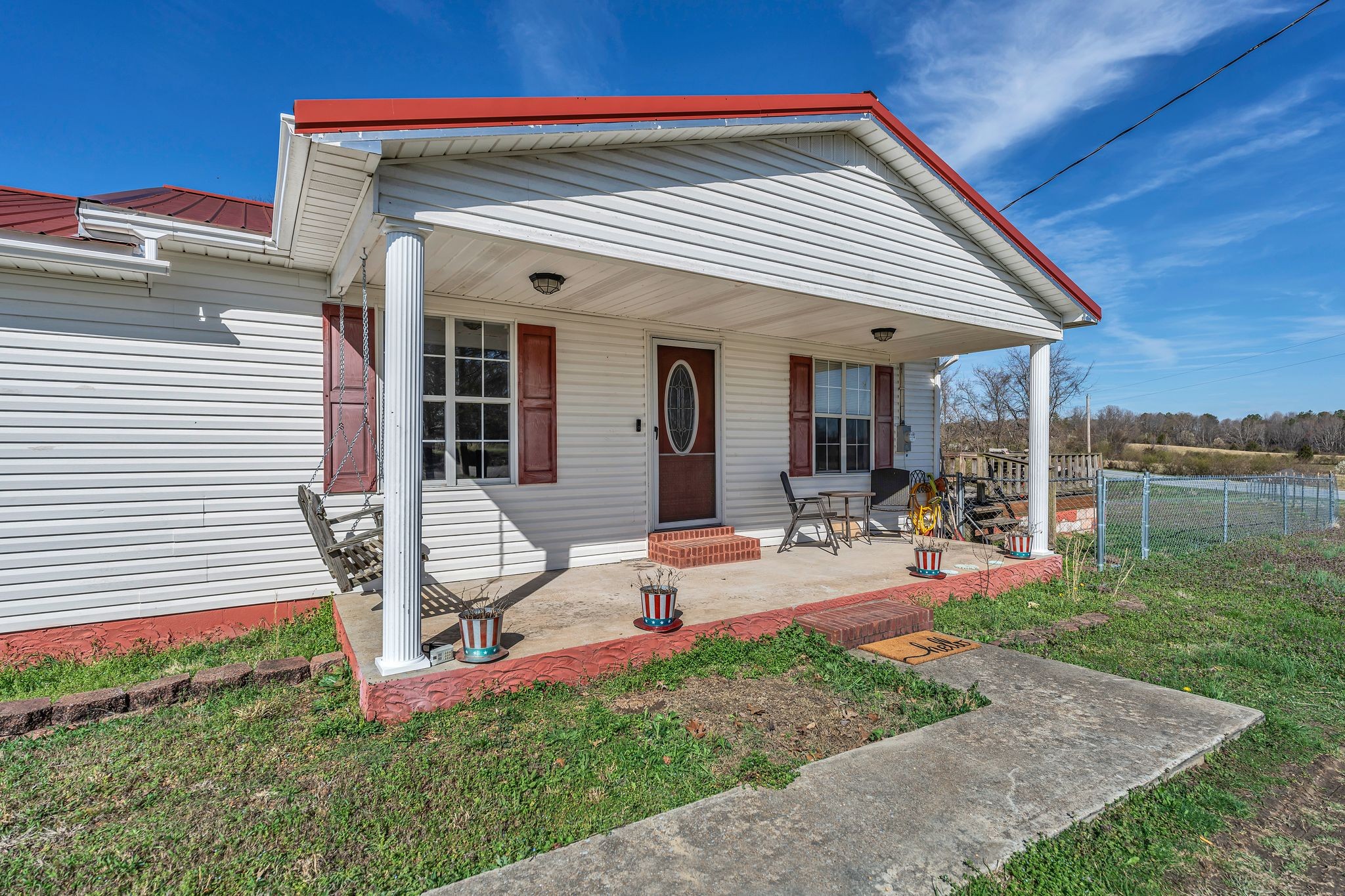 619 Revilo Road Leoma, TN 38468 - Photo 4 of 24 a view of a house with backyard porch and sitting area