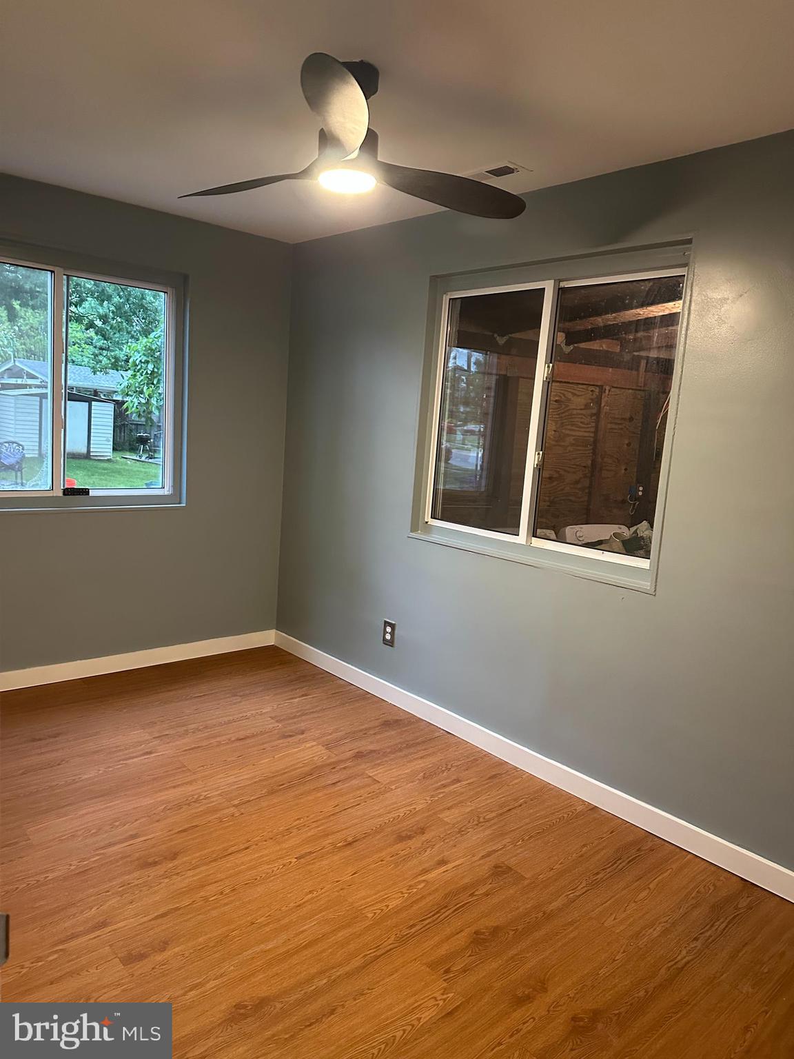 8411 11th Avenue Silver Spring, MD 20903 - Photo 4 of 24 a view of an empty room with a window