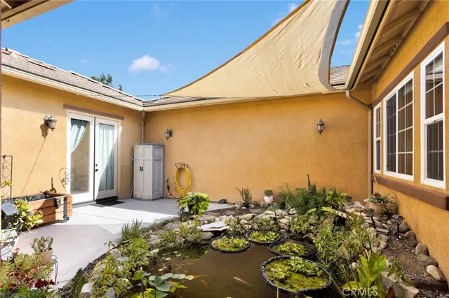 a view of a livingroom with a furniture and a chandelier