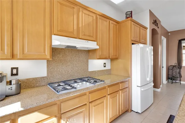 a bed room with a bed and a dresser