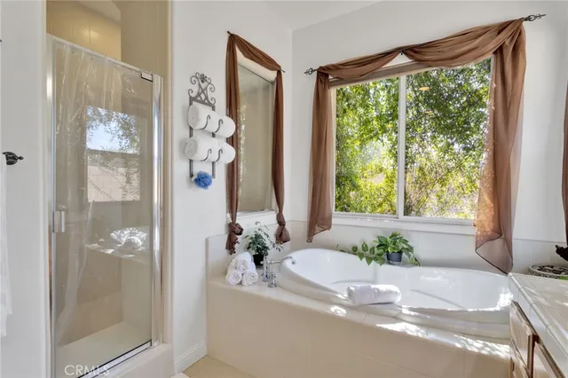 a view of a chairs and table in patio