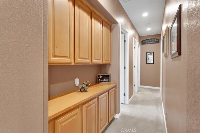 a view of a street with a building in the background