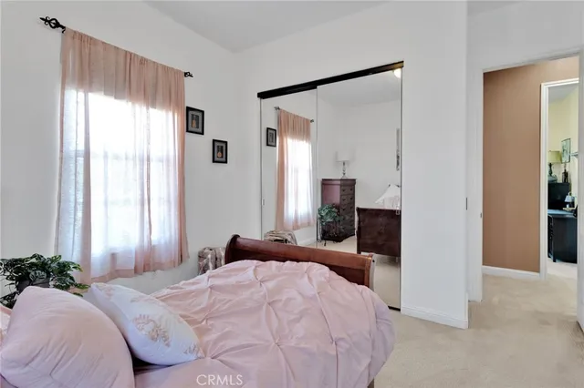 an aerial view of a house with a swimming pool