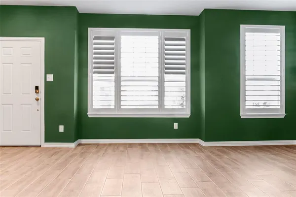 a view of a room that has a window