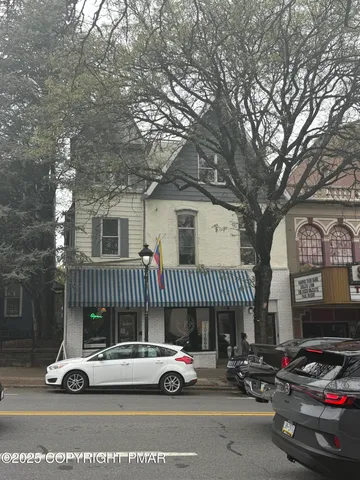 a car parked in front of a house