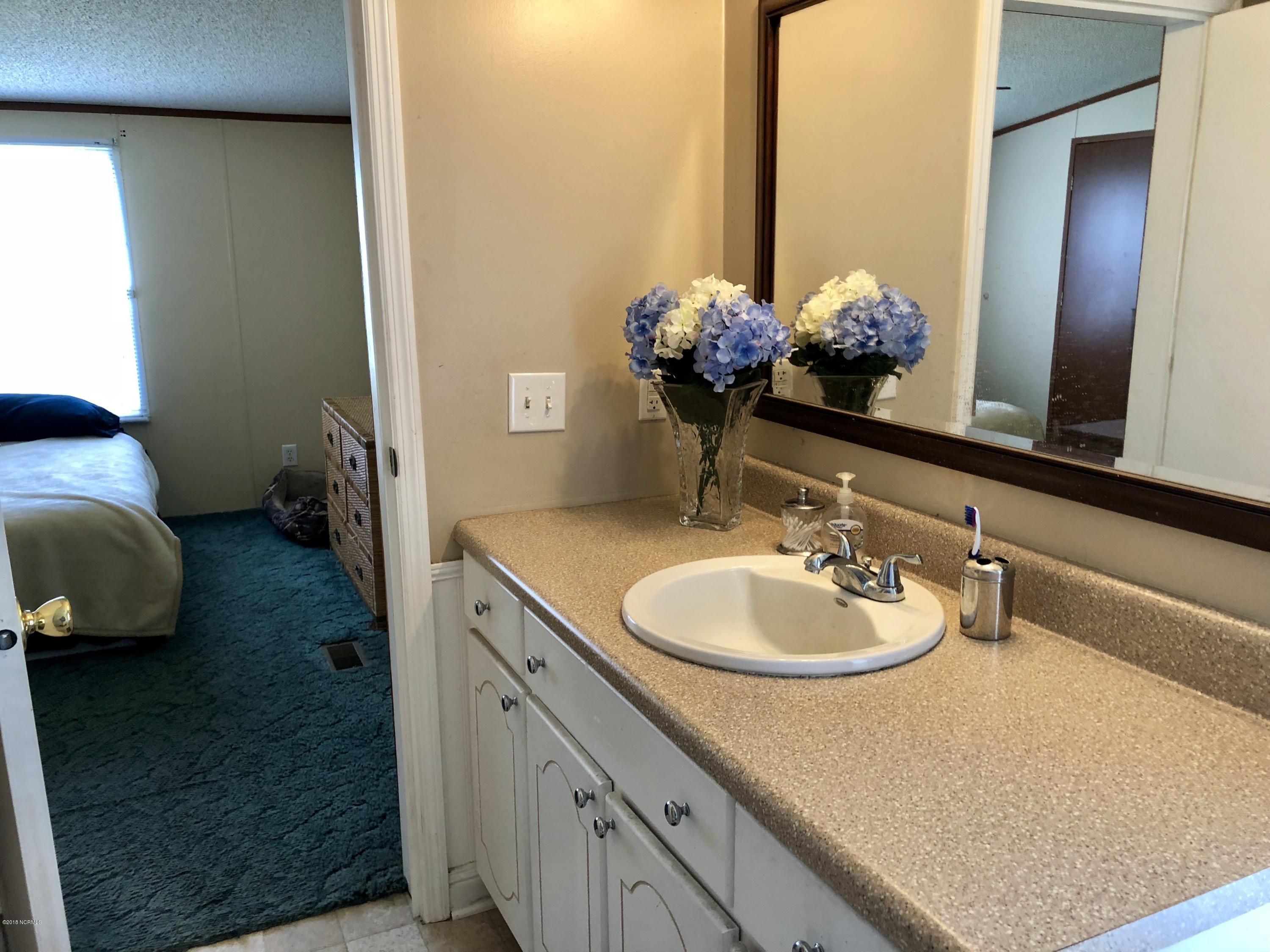 9315 Edwards Road Castalia, NC 27816 - Photo 11 of 16 Master bath
