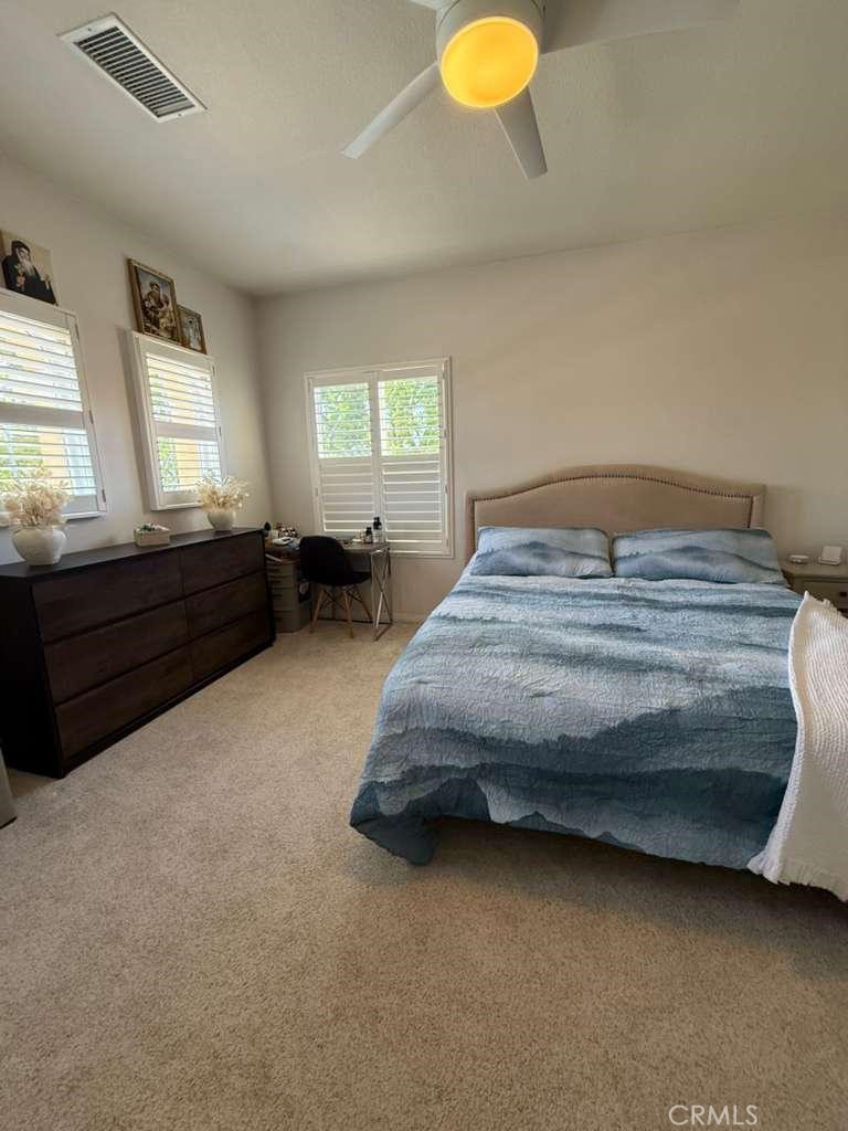 2931 Esperanza Way, Unit B Simi Valley, CA 93063 - Photo 36 of 49 a bedroom with a bed and window