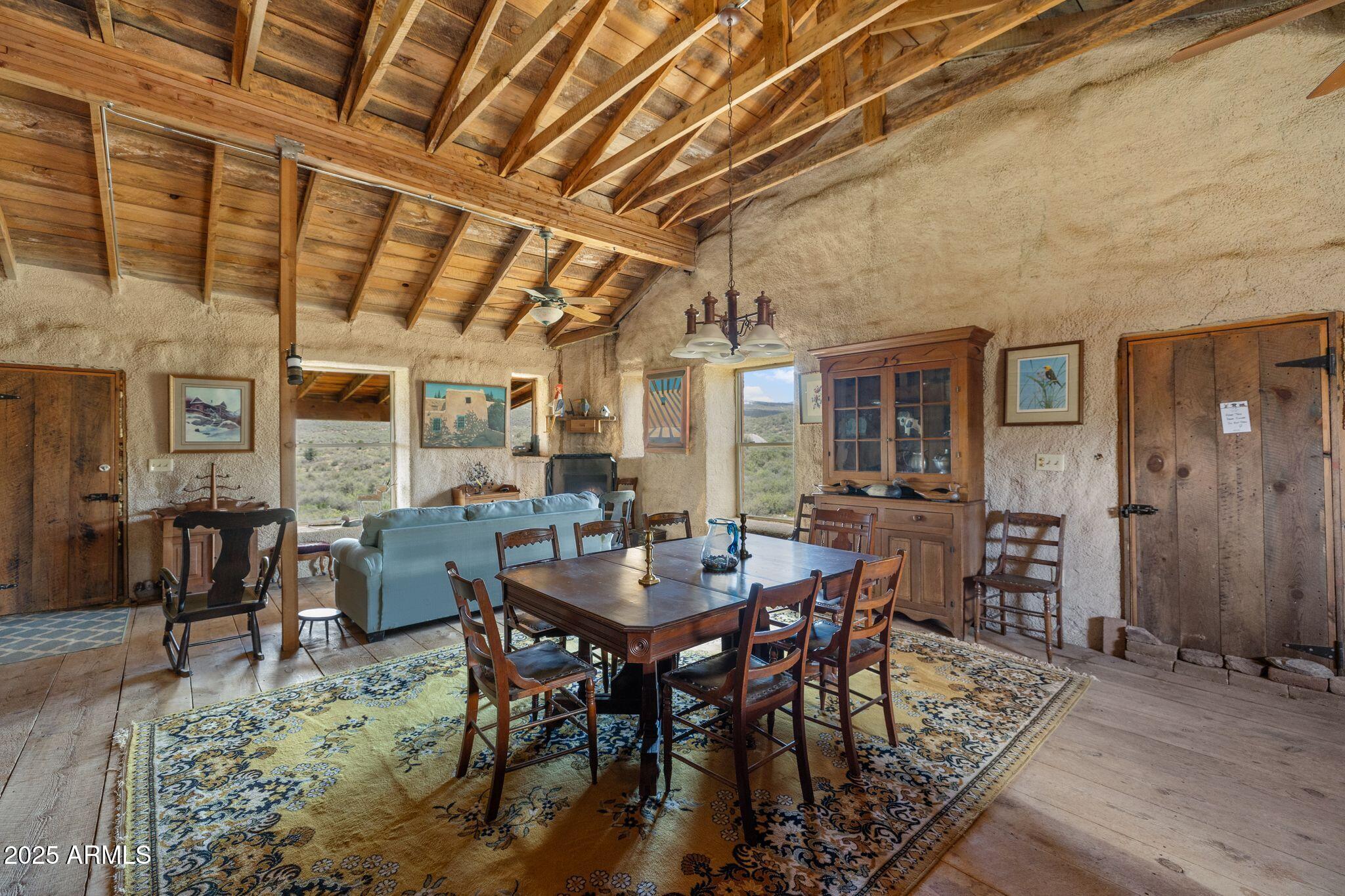 9955 East Iron King Road Mayer, AZ 86333 - Photo 11 of 41 a view of a dining room with furniture