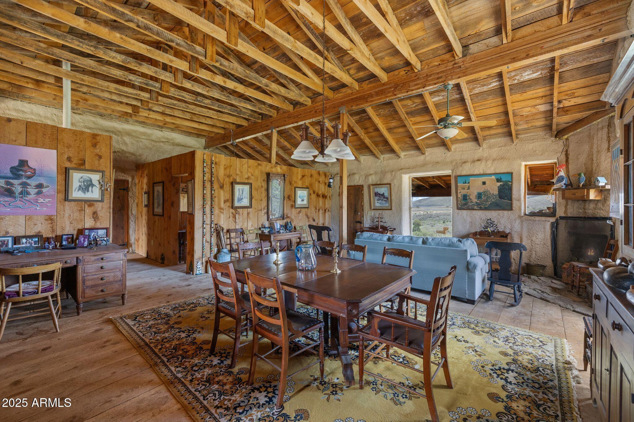9955 East Iron King Road Mayer, AZ 86333 - Photo 12 of 41 a view of a dining room with furniture