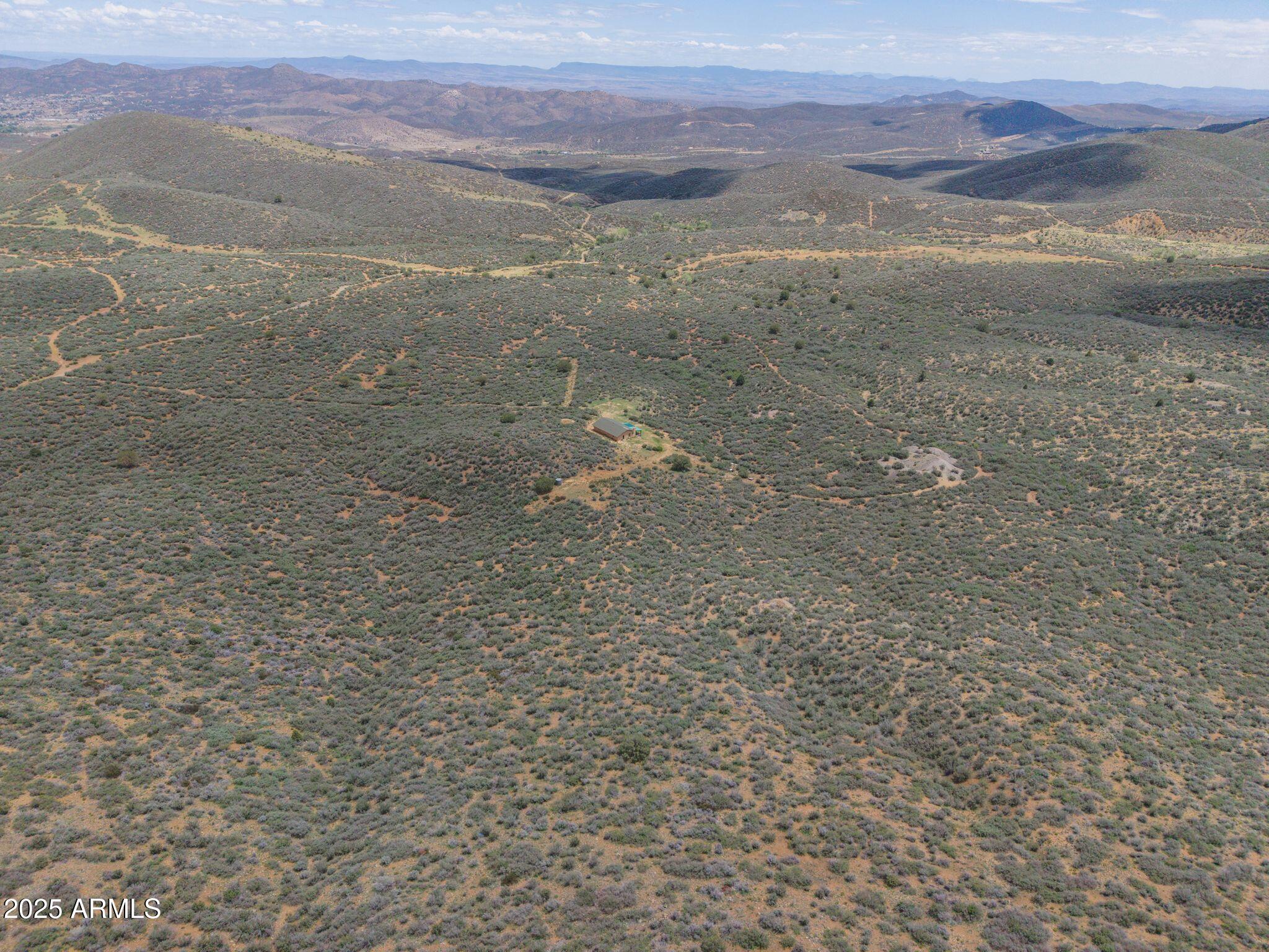 9955 East Iron King Road Mayer, AZ 86333 - Photo 24 of 41 a view of a field with wooden floor