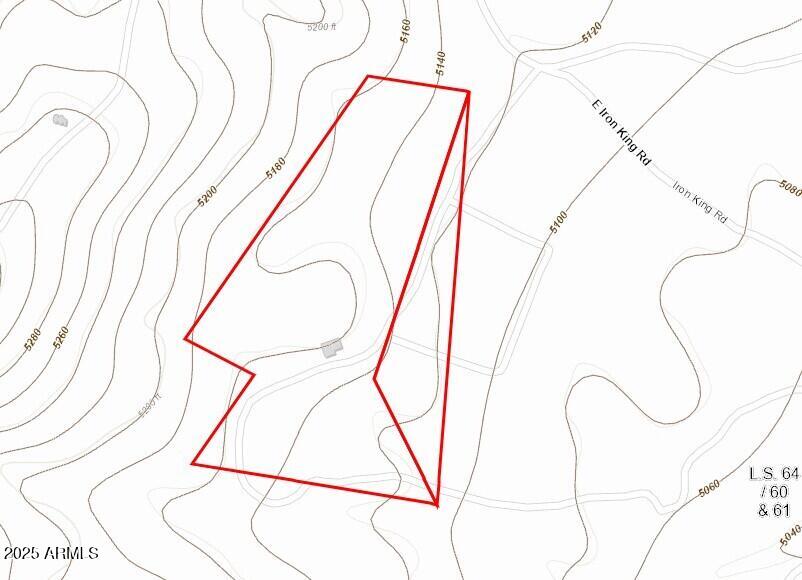 9955 East Iron King Road Mayer, AZ 86333 - Photo 35 of 41 a picture of a field with a next to a wall