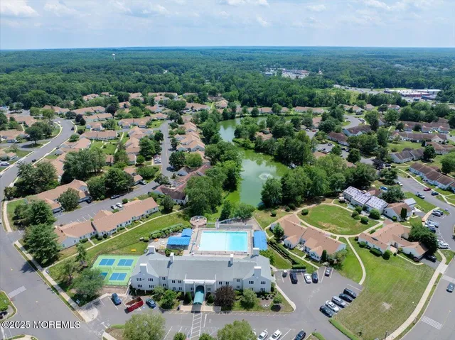an aerial view of a city with lots of residential buildings