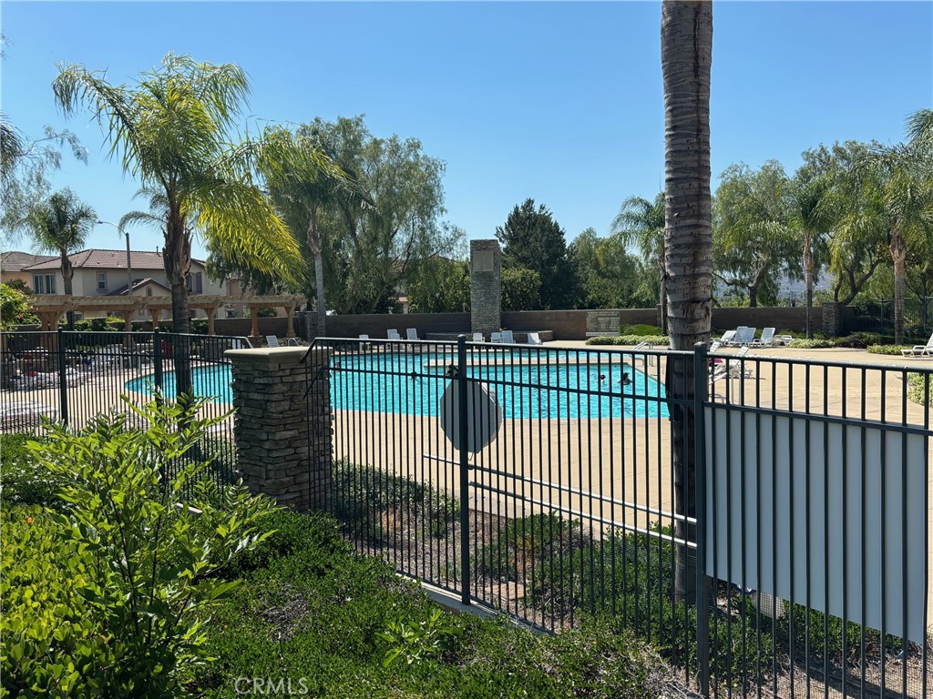 3288 Ledgewood Circle Riverside, CA 92503 - Photo 6 of 6 a view of a backyard with iron fence