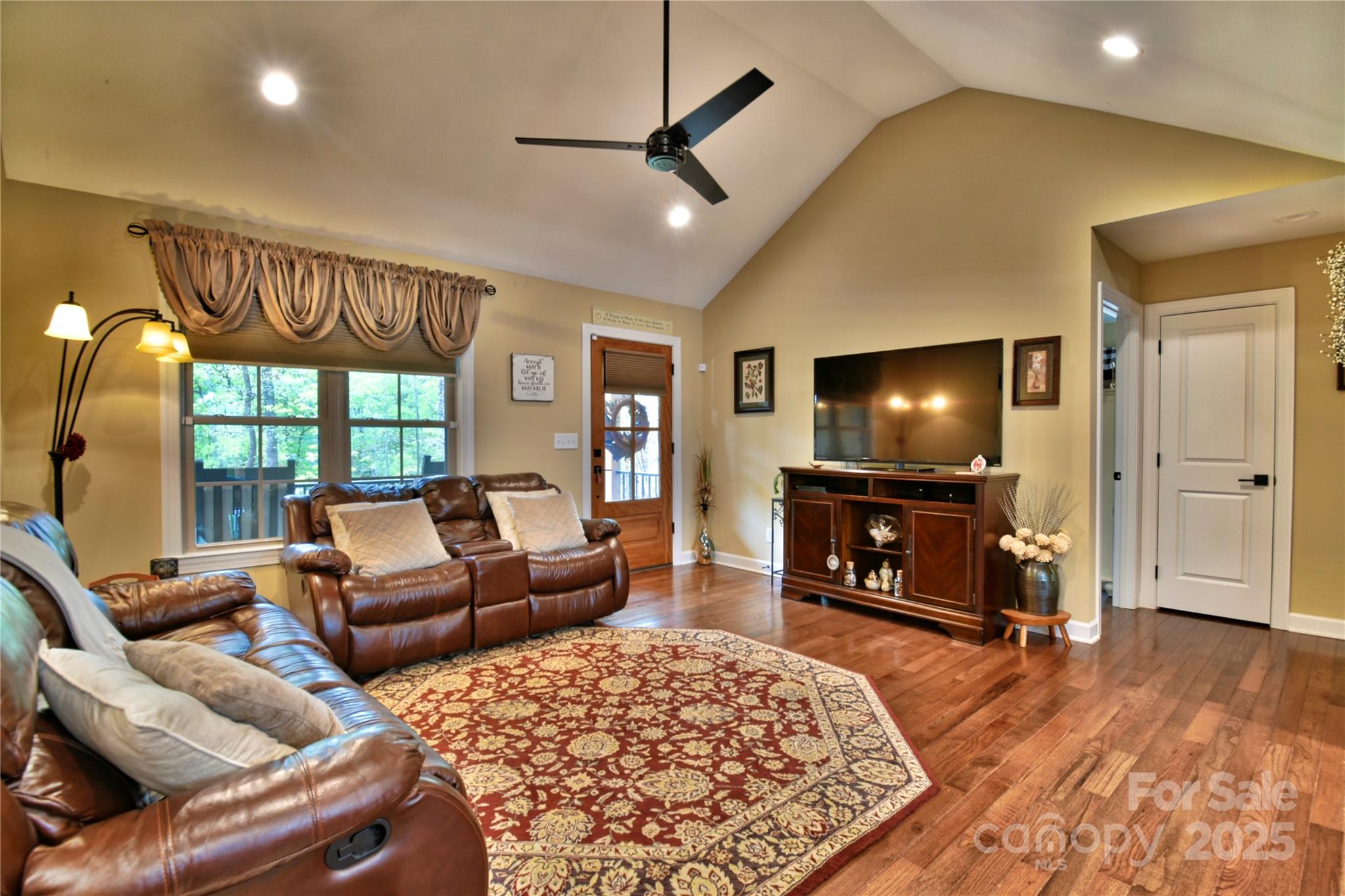 482 Old Camp Road Denton, NC 27239 - Photo 11 of 48 a living room with furniture and a flat screen tv