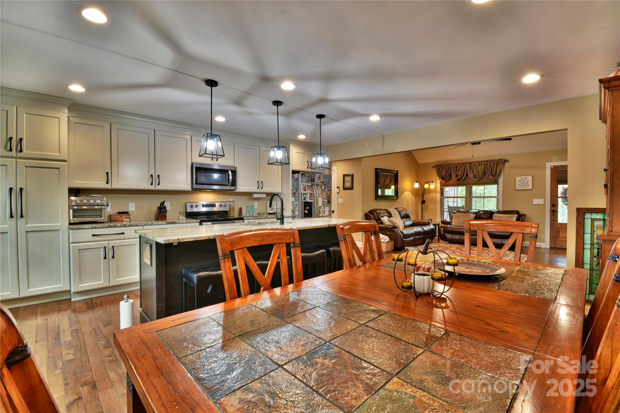 482 Old Camp Road Denton, NC 27239 - Photo 15 of 48 a kitchen with lots of counter top space and stainless steel appliances