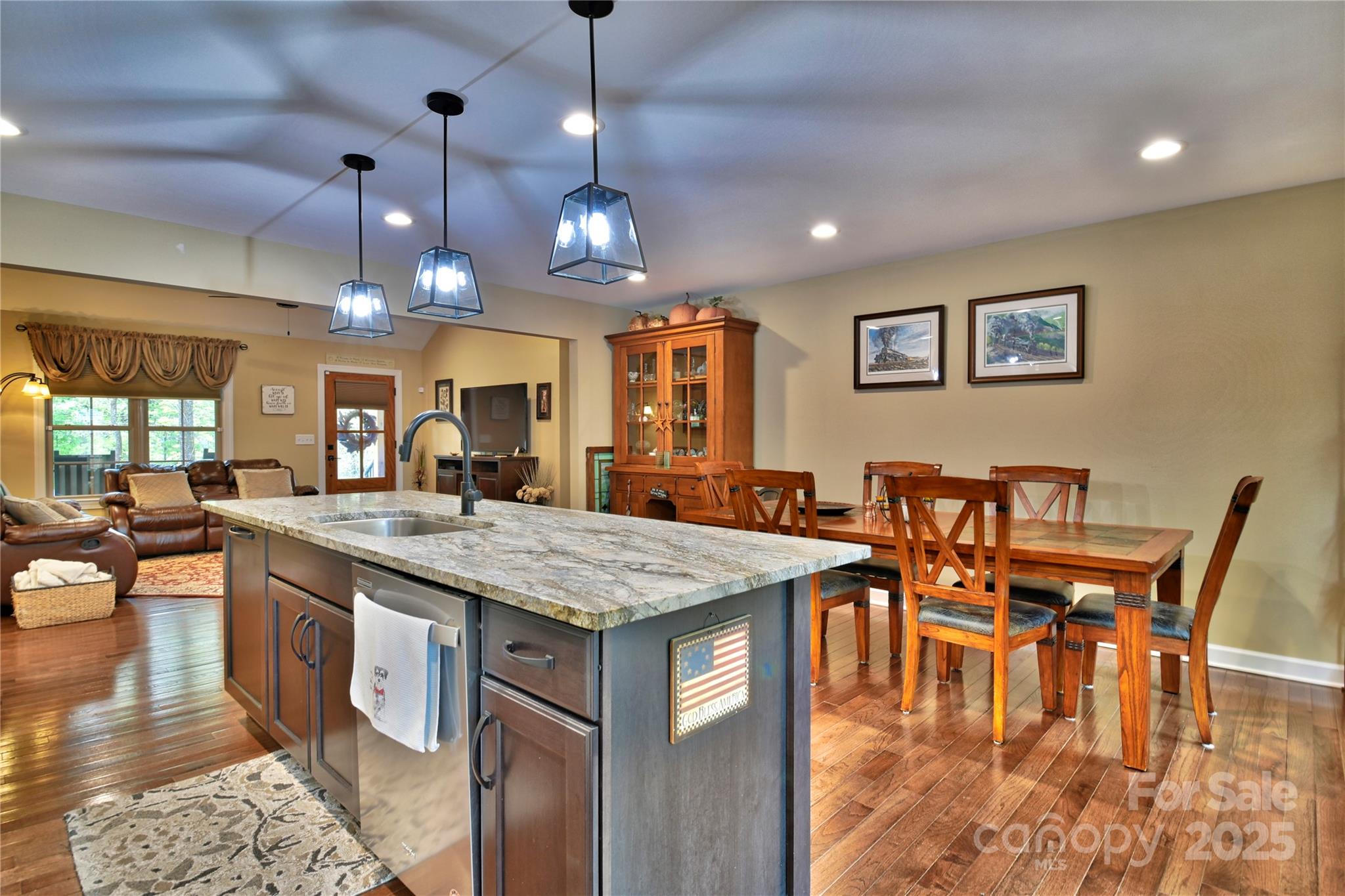 482 Old Camp Road Denton, NC 27239 - Photo 17 of 48 a view of a dining room with furniture and wooden floor