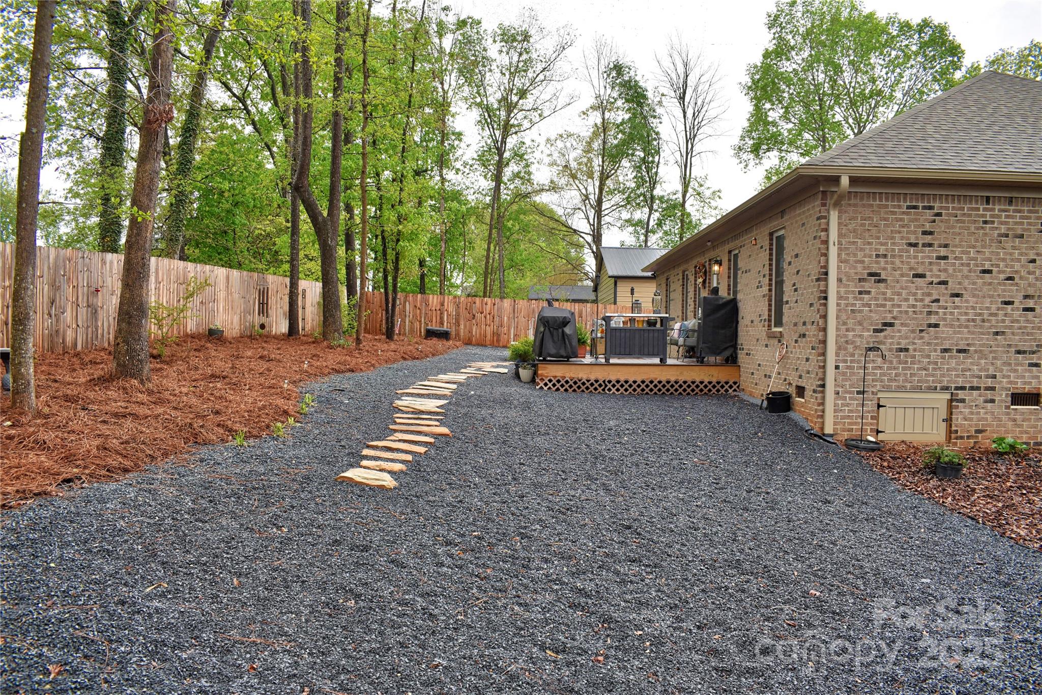 482 Old Camp Road Denton, NC 27239 - Photo 23 of 48 a backyard of a house with barbeque oven
